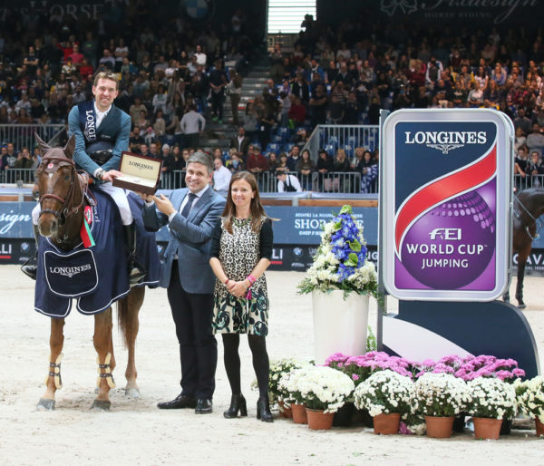 French winners Simon Delestre and Hermes Ryan pictured with Juan Carlos Capelli, Longines Vice-President and Head of International Marketing and Elisa Gasparini, Brand Manager Longines Italy after winning today’s fourth leg of the Longines FEI World Cup™ Jumping 2015/2016 Western European League at Verona, Italy. (FEI/Stefano Secchi)