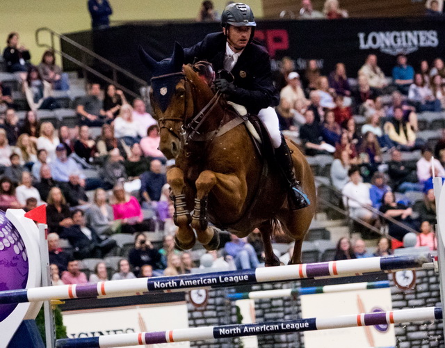 Ireland’s Denis Lynch and RMF Echo flying high as they capture a take top class win at the Longines FEI World Cup™ Jumping in Lexington (USA) overnight. (FEI/Ashley Neuhof)