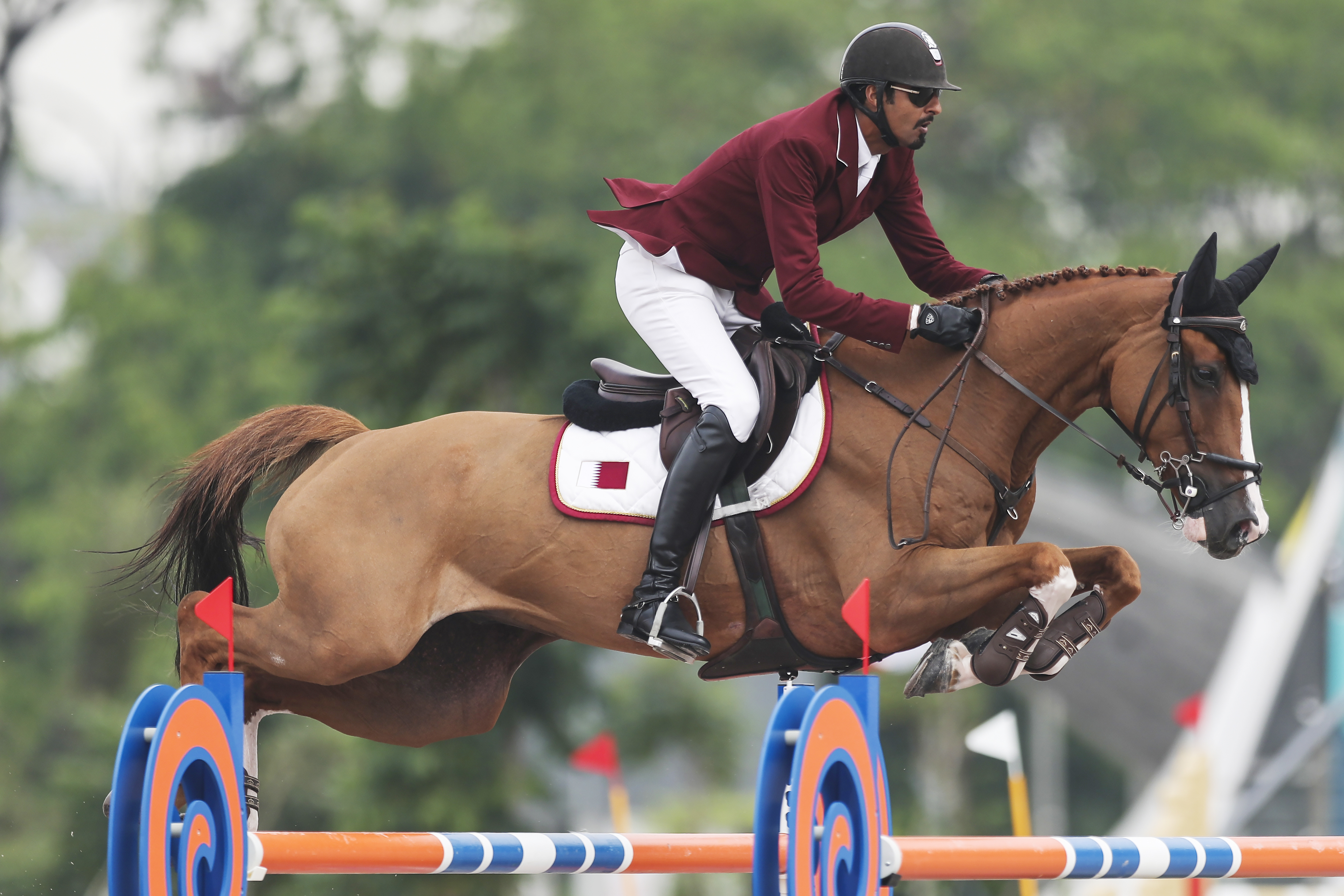 Ali Althani of Qatar rides Sirocco during the jumping event at the equestrian competition of the 18th Asian Games at Jakarta International Equestrian Park on August 28, 2018 in Jakarta, Indonesia. Photo FEI/Yong Teck Lim