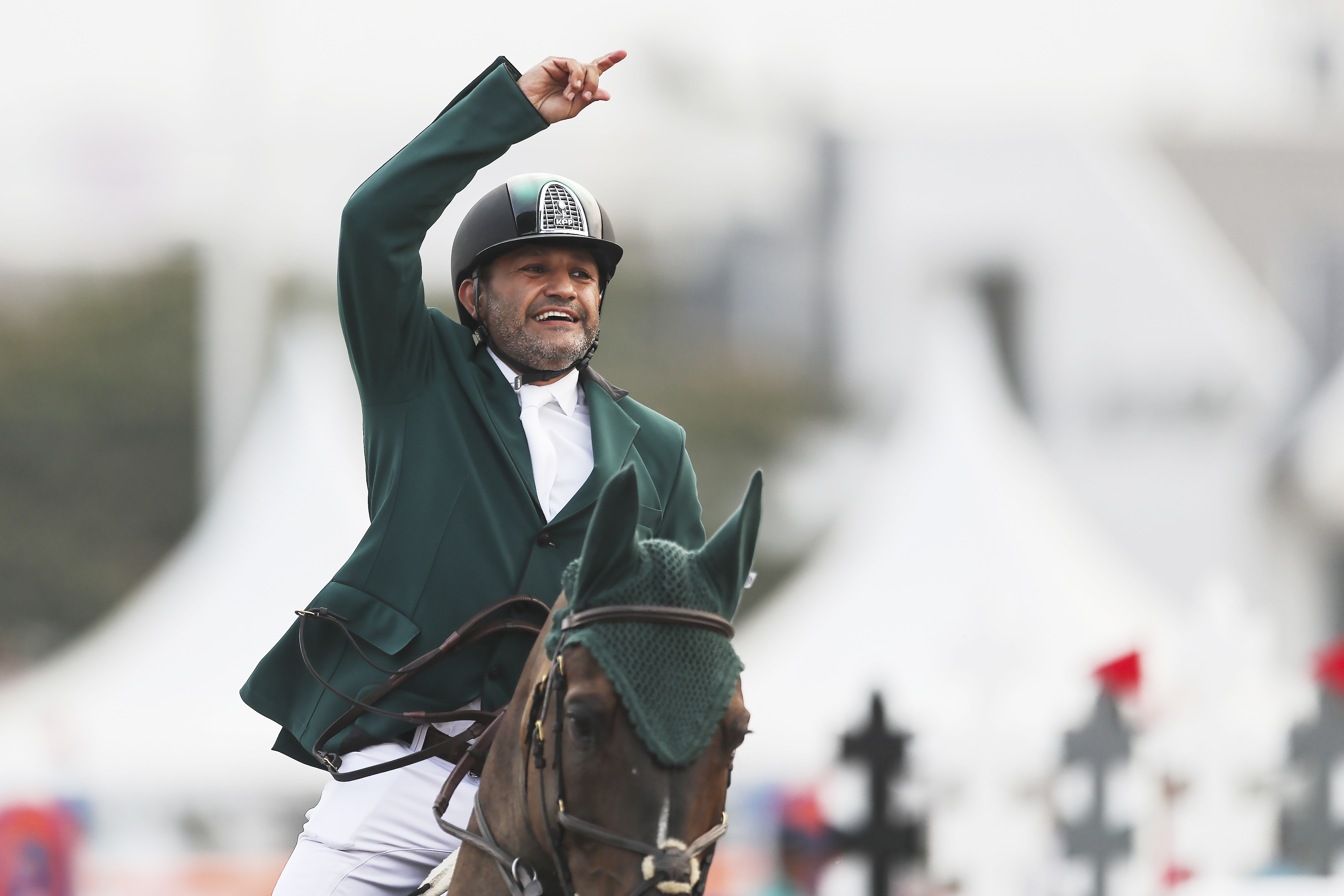 Ramzy Hamad Alduhami of Saudi Arabia, riding Ted, celebrates during the jumping event at the equestrian competition of the 18th Asian Games at Jakarta International Equestrian Park on August 28, 2018 in Jakarta, Indonesia.