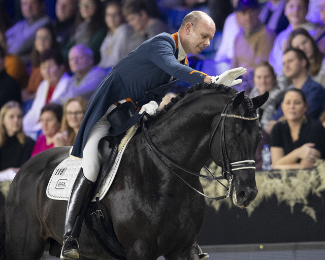 “That’s my boy!” The Netherlands’ Hans Peter Minderhoud congratulates his brilliant young stallion, the 10-year-old Glock’s Dream Boy NOP, after the pair won today’s exciting seventh leg of the FEI Dressage World Cup™ 2018/2019 Western European League in Mechelen, Belgium. (FEI/Dirk Caremans)