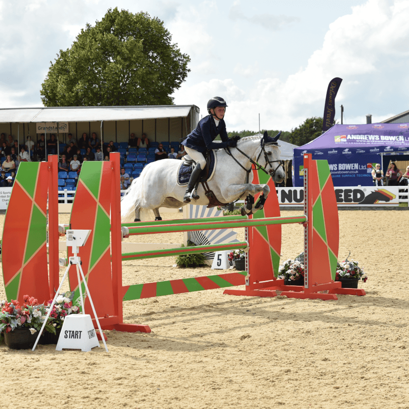 Izabella Rogers Rides Away as BSJA National 128cm Champion