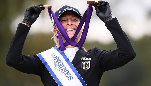 Ingrid Klimke of Germany celebrate with her two gold medals for team competion and single ride after Day 5 of the Show Jumping at the Longines FEI Eventing European Championships 2019 on September 01, 2019 in Luhmuhlen, Germany. (Photo by Oliver Hardt/Getty Images for FEI)