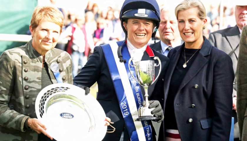 Pippa Funnell collecting the Land Rover Burghley Horse Trials Trophy. Image credit Mike Bain
