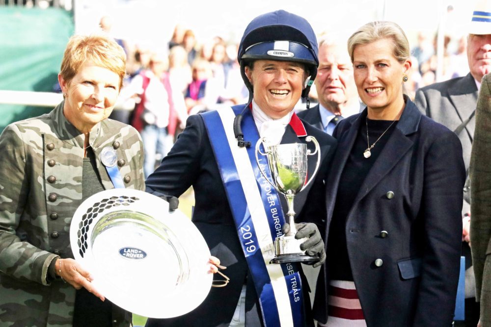 Pippa Funnell collecting the Land Rover Burghley Horse Trials Trophy. Image credit Mike Bain