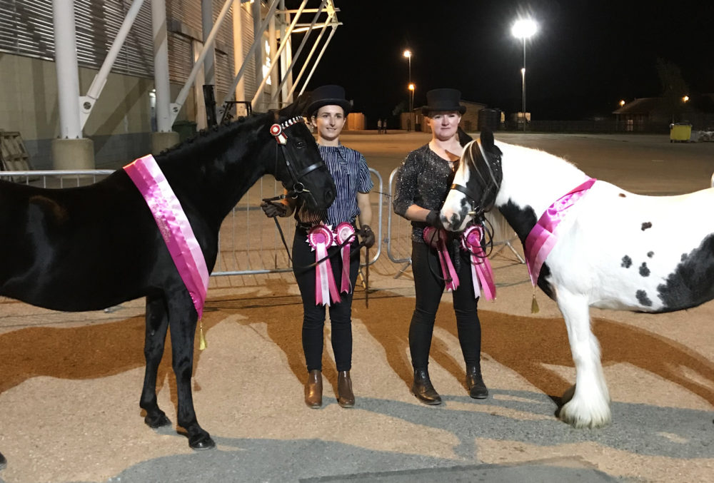 The ponies with their grooms after winning
