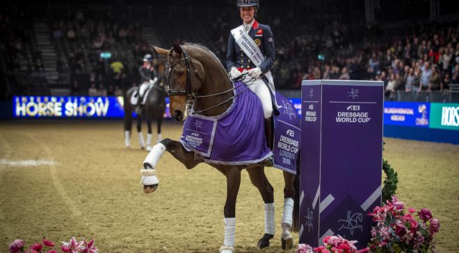 Coronavirus COVID-19 release for FEI cancellation recommendation - image Charlotte Dujardin riding Mount St John Freestyle at Olympia, in the main hall 2019. FEI Dressage World Cup class.
