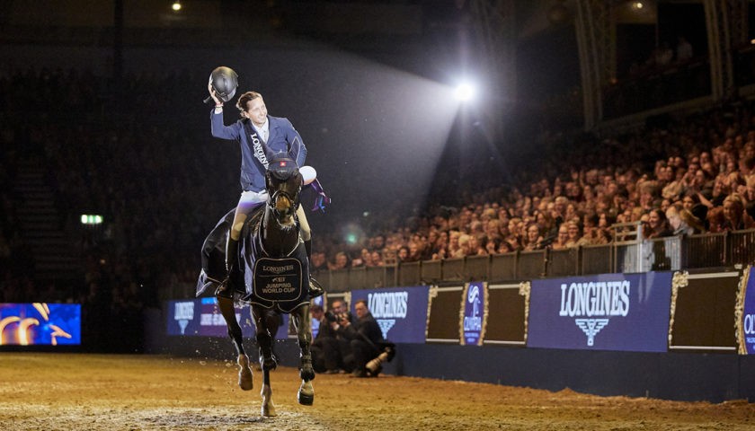 Martin Fuchs at Olympia, The London International Horse Show during his lap of honour