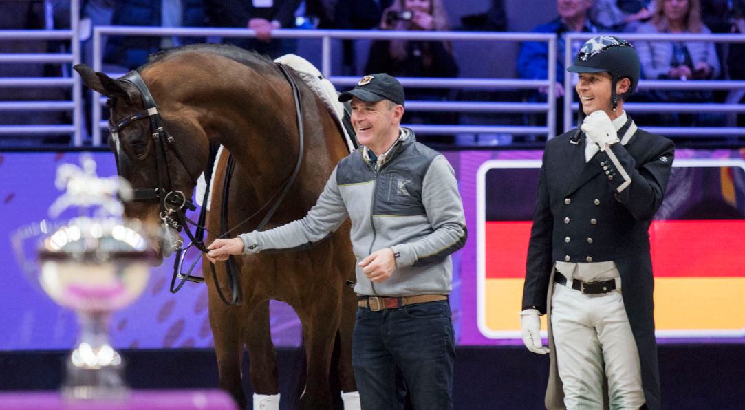 : Having a laugh during the prizegiving at the FEI Dressage World Cup™ Final 2017 in Omaha (USA) where Great Britain's Carl Hester and Nip Tuck finished third - (L to R) Nip Tuck, groom Alan Davies and Carl Hester. (FEI/Cara Grimshaw)