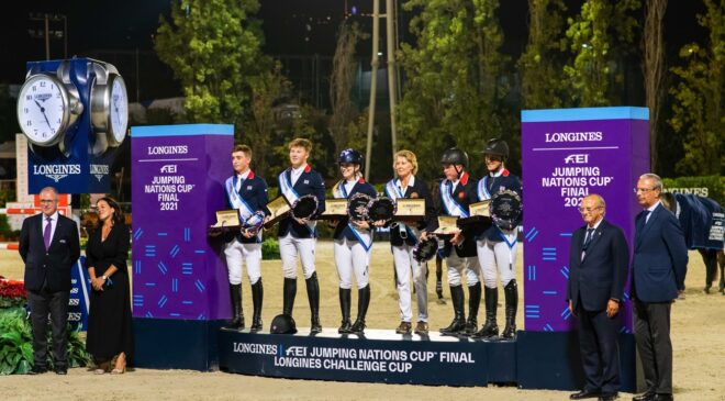 Team Great Britain won the Challenge Cup Trophy tonight at the Longines FEI Jumping Nations Cup™ Final 2021 at the Real Club de Polo in Barcelona, Spain. (L to R) Jack Whitaker, Harry Charles, Emily Moffitt, Chef d’Equipe Di Lampard, John Whitaker and Holly Smith. (FEI/Lukasz Kowalski)