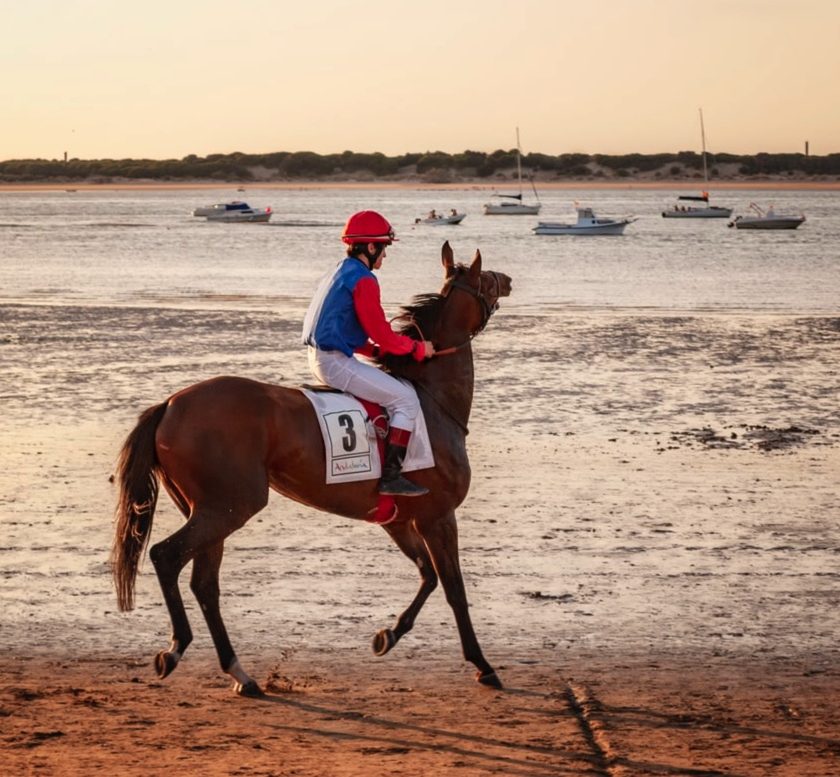 image of jockey on beach for article The Most Influential Female Jockeys in Grand National History