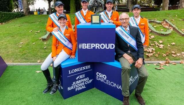 The winning Dutch team at the Longines FEI Jumping Nations Cup™ Final 2021 in Barcelona, Spain - (L to R back) Willem Greve, Kevin Jochems, Harrie Smolders and Maikel van der Vleuten, (L to R front) Sanne Thijssen and Chef d’Equipe Rob Ehrens. (FEI/Lukasz Kowalski)