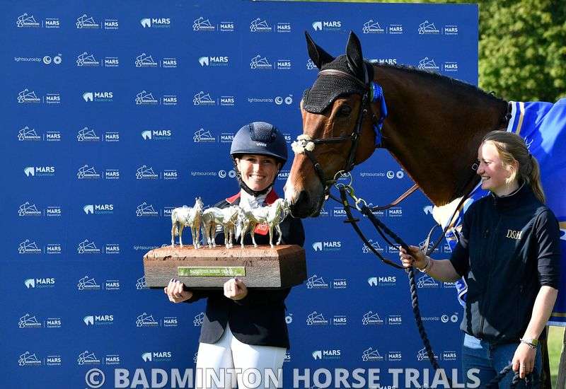 LAURA COLLETT AND WINNING HORSE LONDON 52 WITH THE BADMINTON HORSE TRIALS TROPHY WITH GROOM TILLY HUGHES