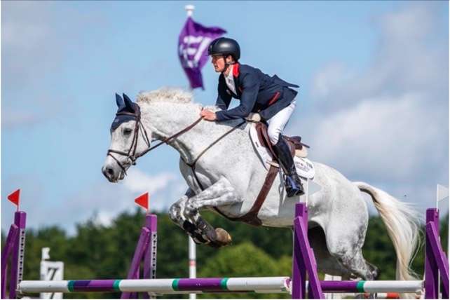 Britain's Tom McEwen rides Bob Chaplin during the CCIO4*-S Jumping phase of the FEI Eventing Nations Cup™ at Houghton Hall (GBR) where Team GB clinched the home win over the USA and Sweden on Sunday 29 May 2022. (FEI/Libby Law)