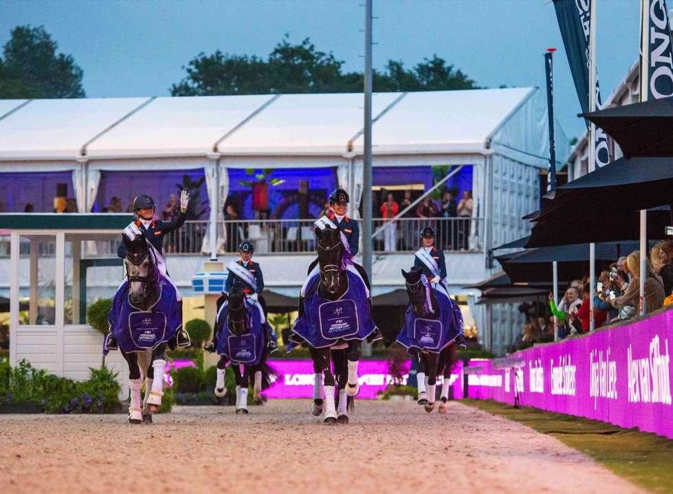 The lap of honour, from left to right - Thamar Zweistra and Hexagon’s Ich Weiss, Lynne Maas and Eastpoint, Emmelie Scholtens and Indian Rock, and Dinja van Liere with Hermes of the Netherlands - winners of the FEI Dressage Nations Cup™ 2022 - Rotterdam (NED) (FEI/Shannon Brinkman)