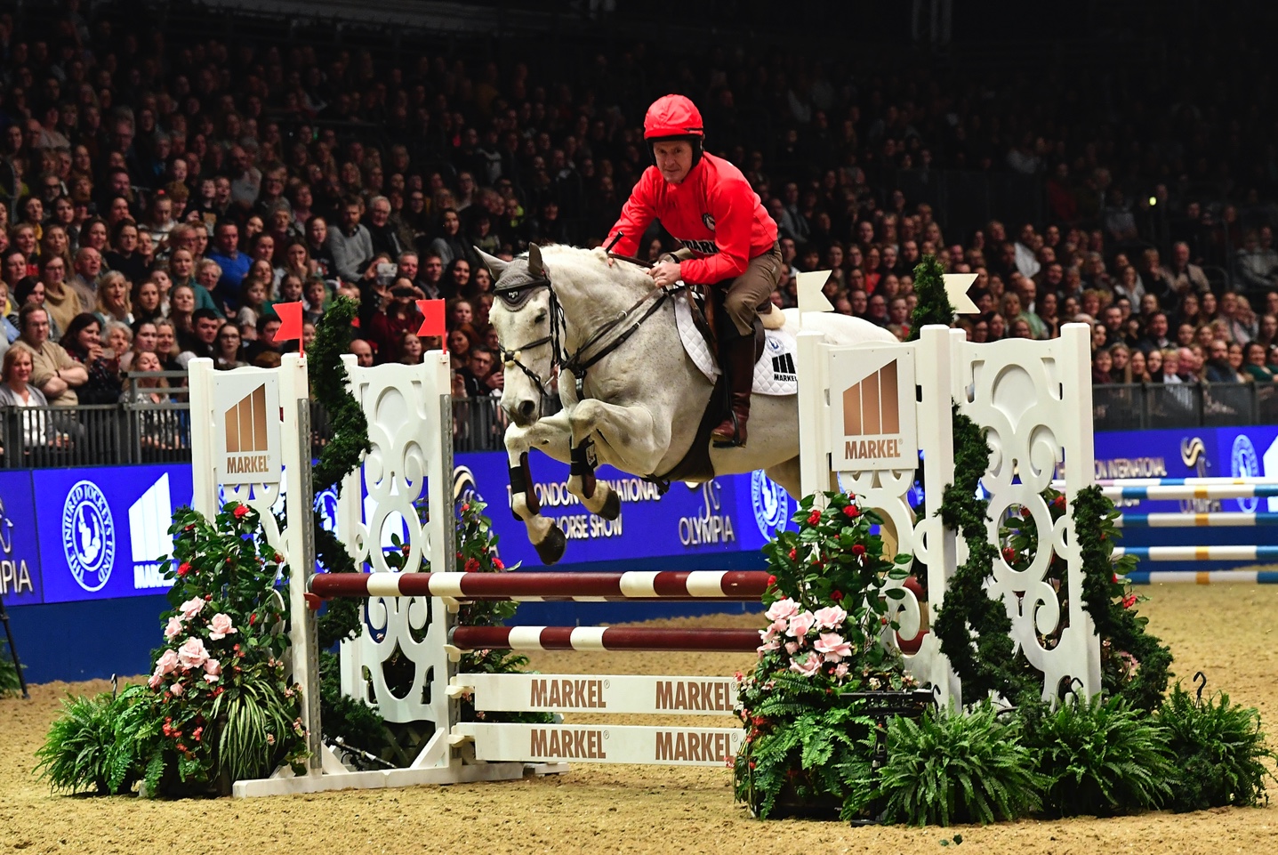 Sir Anthony McCoy riding at The London International Horse Show in the Markel Jockeys Jumping
