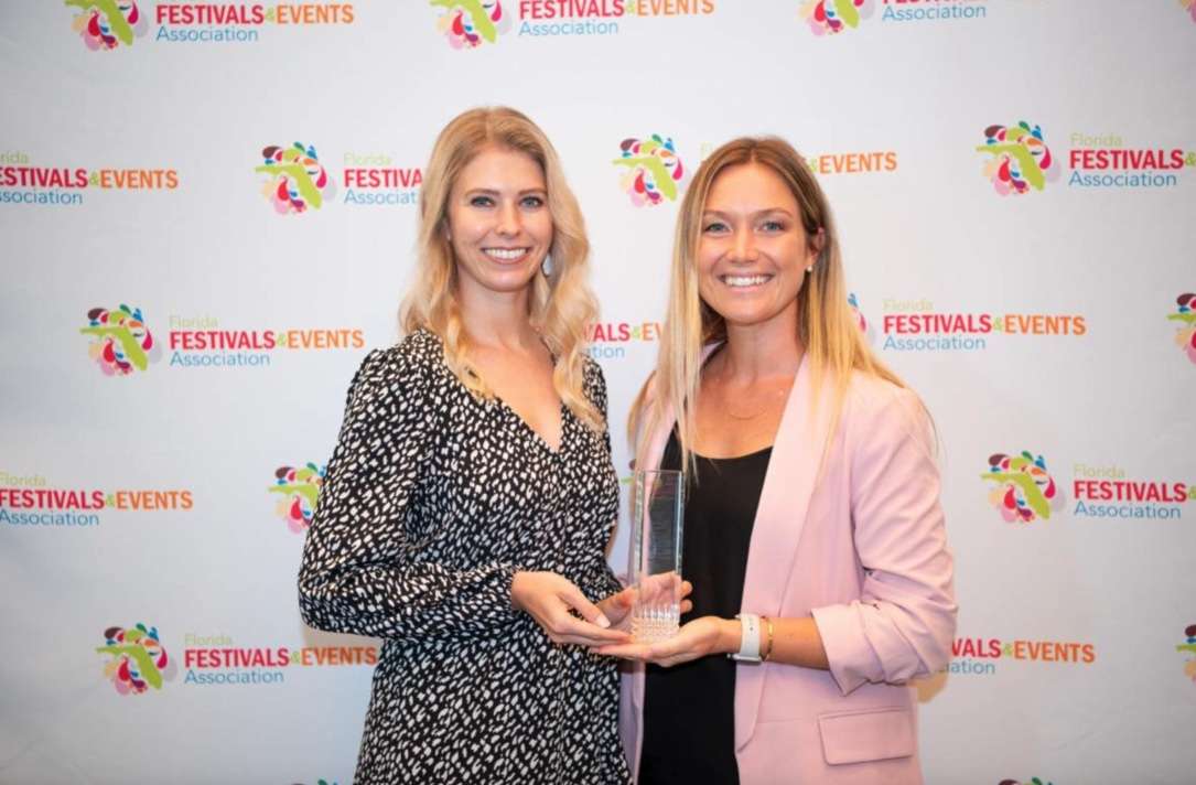 Representatives Elaine Wessel and Courtney Schintzius accepted the awards on behalf of Wellington International. ©FFEA