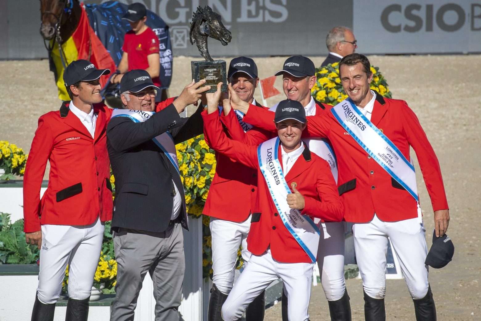 Team Belgium won the Longines FEI Jumping Nations Cup™ 2022 Final at Real Club de Polo in Barcelona, Spain today. (L to R) Olivier Philippaerts, Peter Weinberg (Chef d’Equipe), Jérôme Guery, Koen Vereecke, Gregory Wathelet and Gilles Thomas. (FEI/Richard Juilliart)