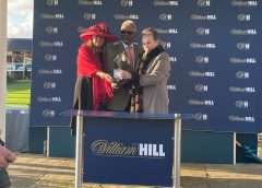 Brian Paul accepts his Lifetime In Racing Award from Racing Welfare trustee Venetia Wrigley DL 2