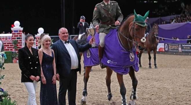 Commandant Geoff Curran and Bishops Quarter win the HOYS 2022 Puissance in front of a capacity crowd. Image credit 1st Class Images