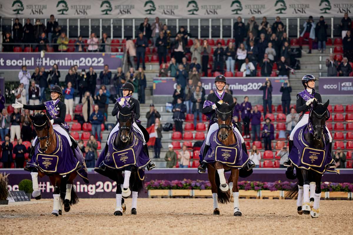 Blue Hors FEI Dressage World Championship 2022, Herning (DEN). Team Championship Grand Prix on 6 August 2022. Team DEN during the lap of honour, Denmark finished in gold medal position. Copyright of FEI / Liz Gregg