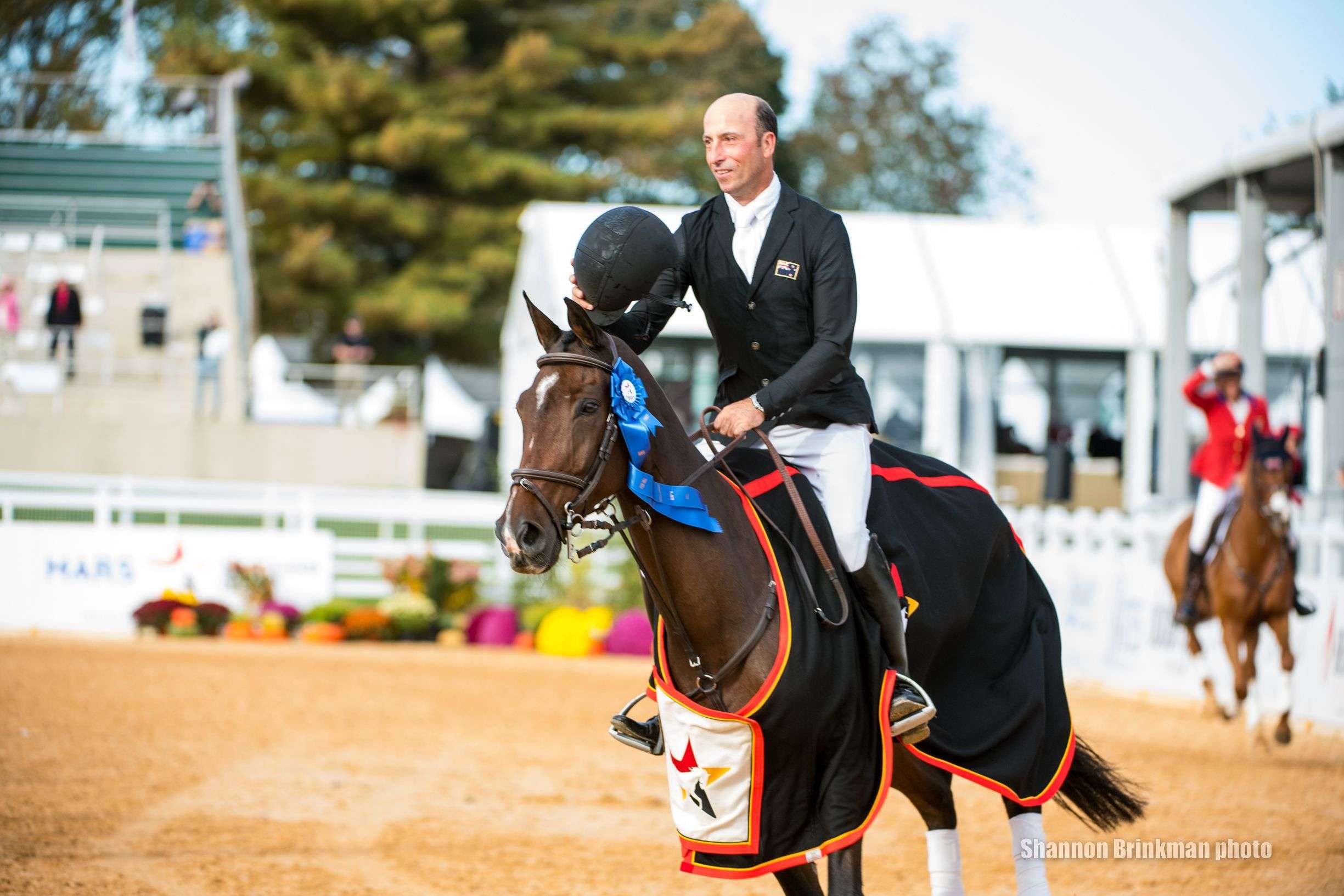 Tim Price and Coup De Coeur Dudevin enjoying the winners lap of honour. Image credit Shannon Brinkman Photography