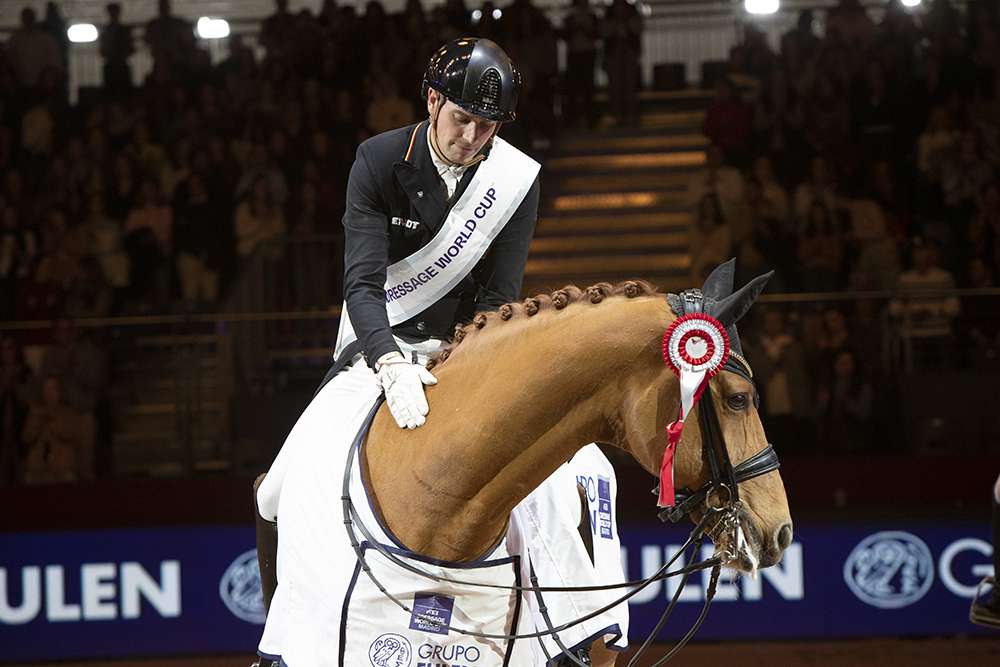 Germany’s Frederic Wandres and Duke of Britain FRH enjoy a quiet moment of reflection during the prizegiving after winning tonight’s FEI Dressage World Cup™ 2022/2023 Western European League qualifier in Madrid (ESP). (FEI/Nacho Olano)