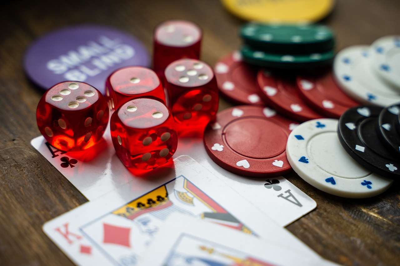 Analysing horse racing results an image of dice and cards to represent gambling