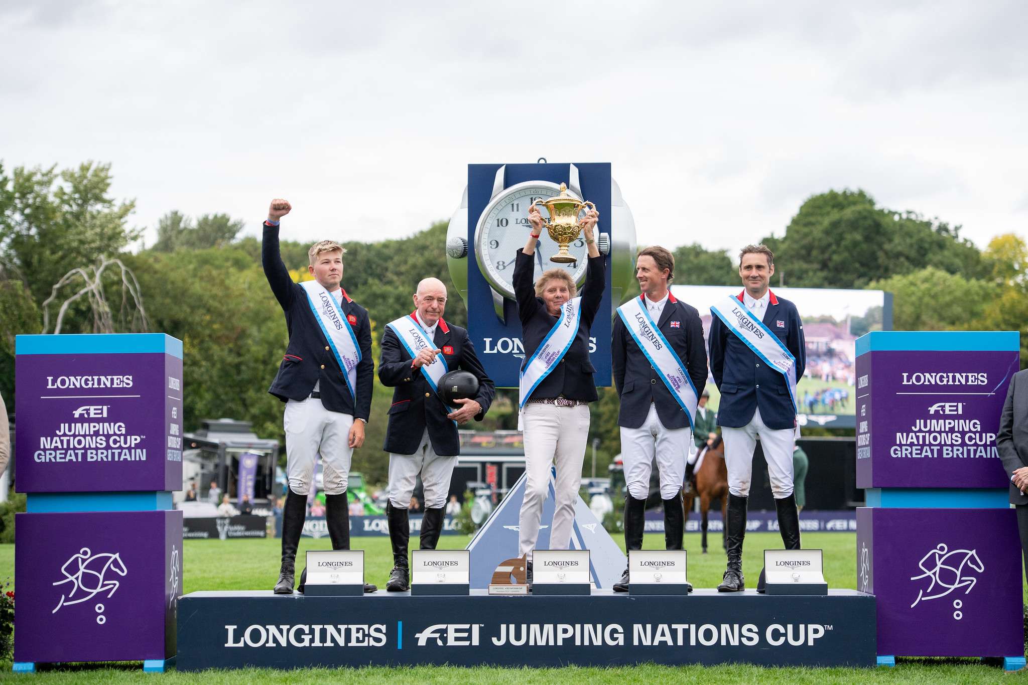 Great Britain team (L-R) Harry Charles, John Whitaker, Di Lampard (Chef d'Equipe), Ben Maher and Tim Gredley, winners of the LONGINES FEI Jumping Nations Cupâ¢ of Great Britain - Longines Royal International Horse Show - Hickstead, West Sussex, United Kingdom - 28 July 2023