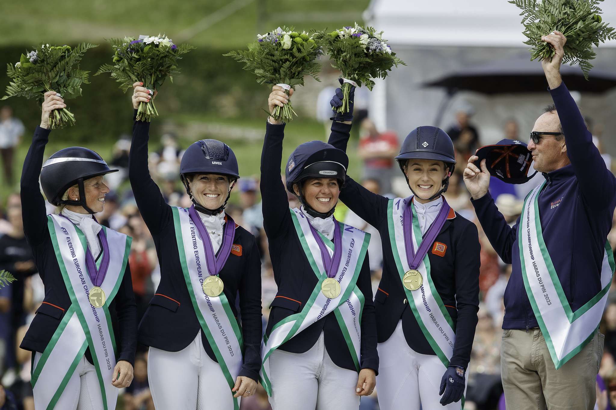 Team GOLD - Team Great Britain: Rosalind Canter; Laura Collett; Kitty King; Yasmin Ingham and Chef d'Equipe Richard Waygood. The Medal Ceremony. 2023 FRA-FEI Eventing European Championships | Haras du Pin, France. Sunday 13 August 2023. Copyright Photo: FEI/Libby Law Photography