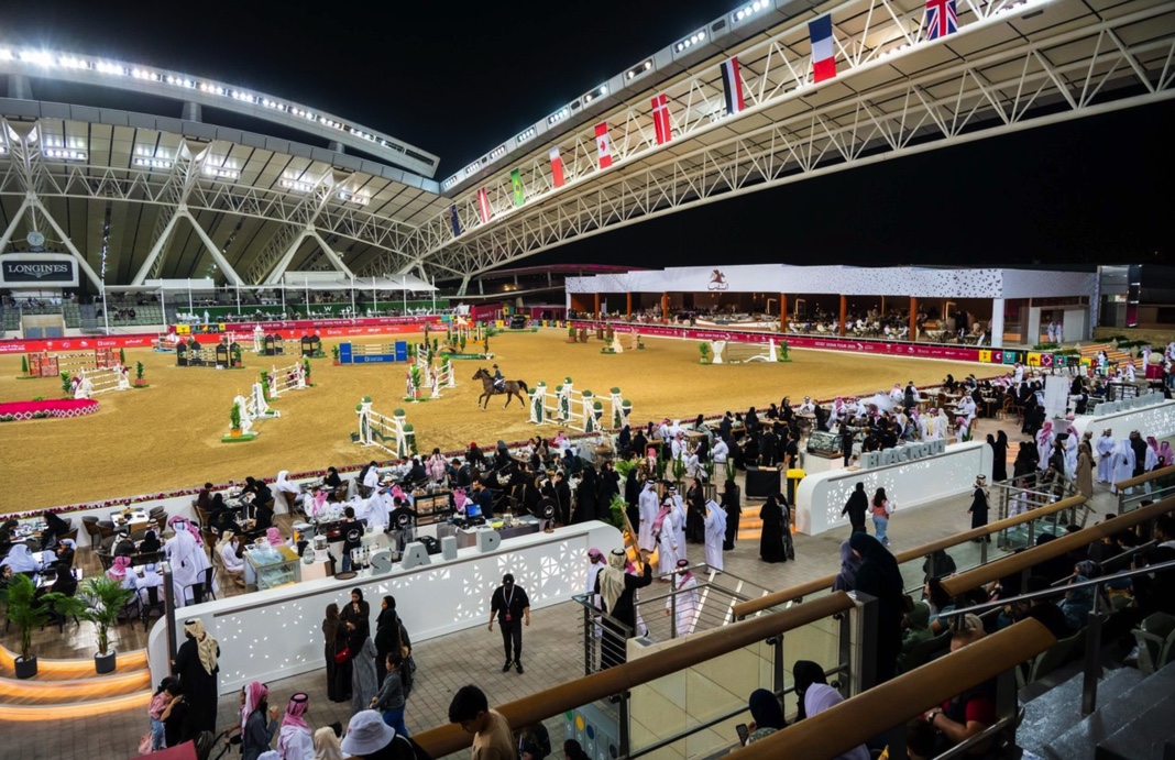horse riders in an arena representing the Doha Tours