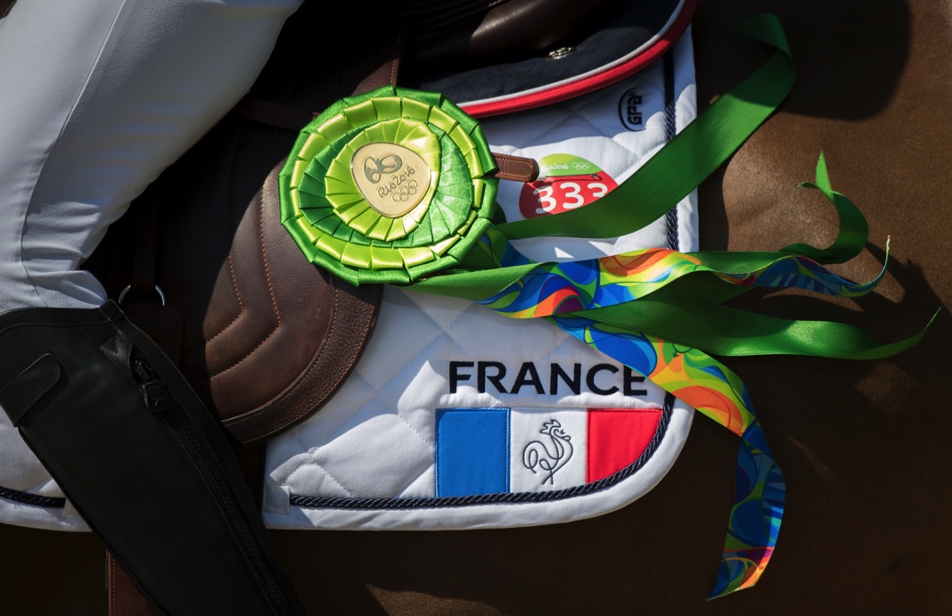 Longines League of Nations. Image of a saddlepad with France and a rossette on it