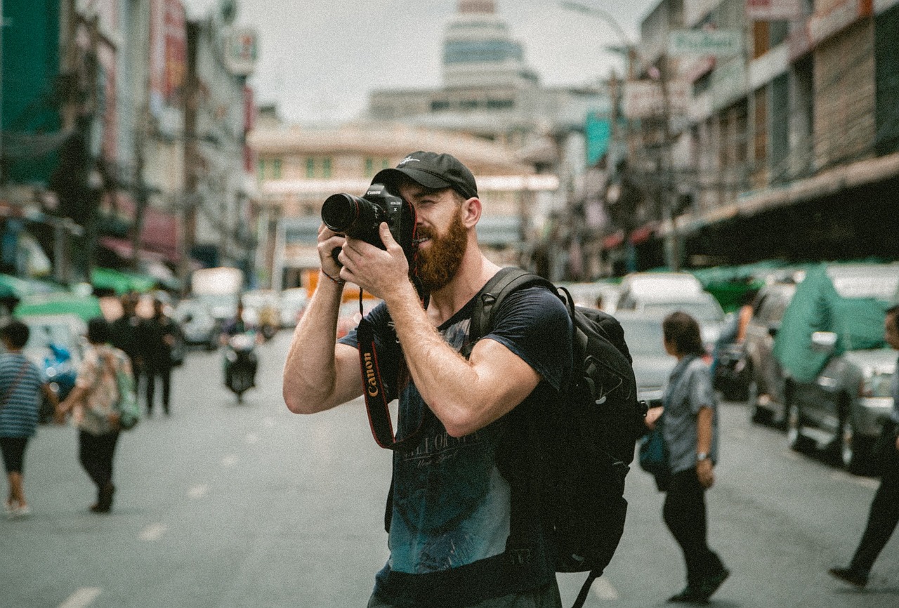 Millennials recognise hobbies and careers can go hand in hand. image of a male photographer