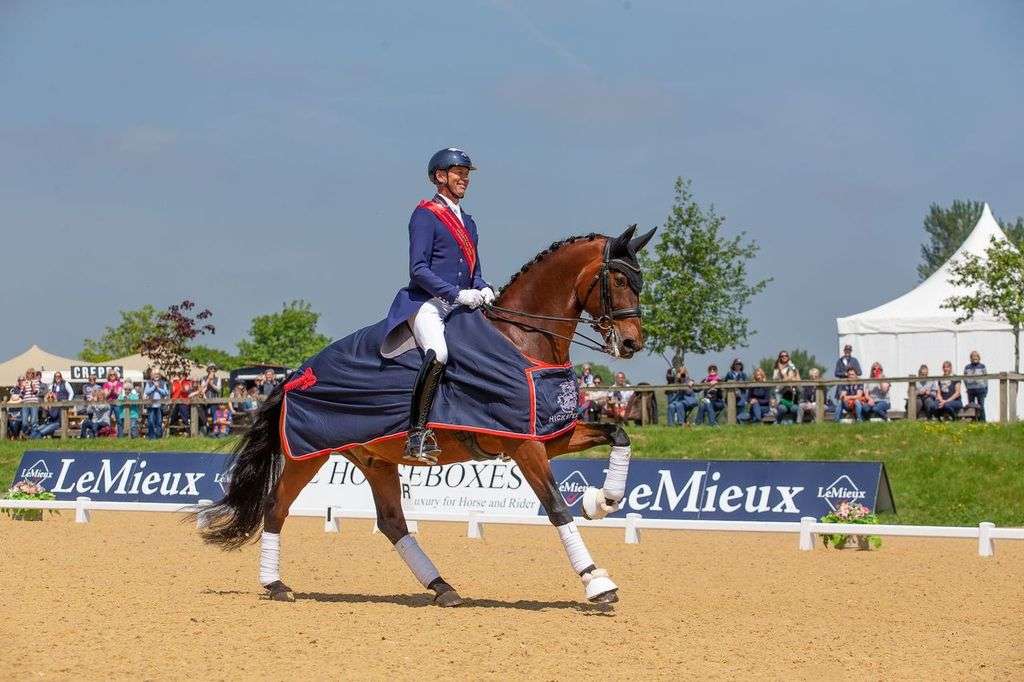 Carl Hester riding a horse at Hickstead