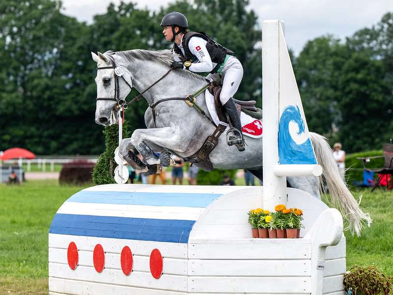 MÉLODY JOHNER of Switzerland on TOUBLEU DE RUEIRE competes in the cross-country to finish fourth after two disciplines in the FEI Eventing Nations Cup™ of Switzerland in Avenches, Switzerland, June 8, 2024.