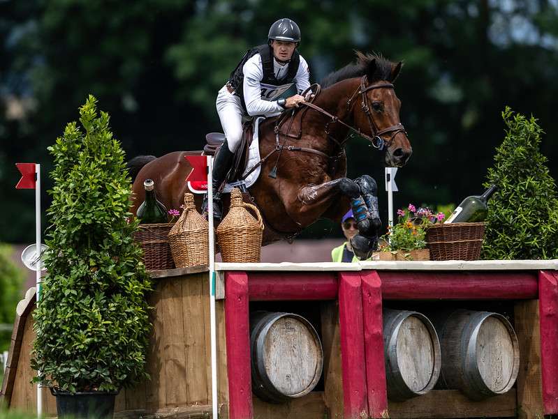 ROBIN GODEL of Switzerland on GRANDEUR DE LULLY competes in the cross-country to lead the FEI Eventing Nations Cup™ of Switzerland in Avenches, Switzerland, June 8, 2024.