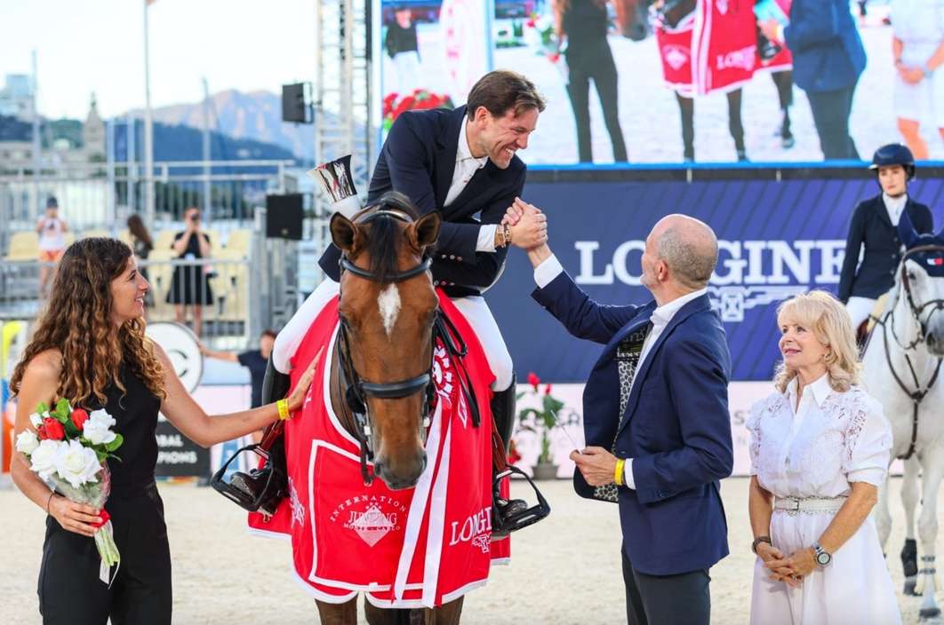 Longines Global Champions Tour Simon Delestre and Olga van de Kruishoeve collection the Longines rug and class trophy