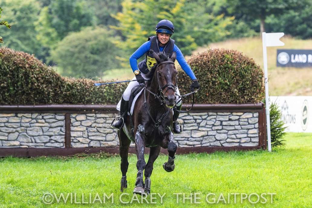 Saffron Cresswell galloping on a bay horse