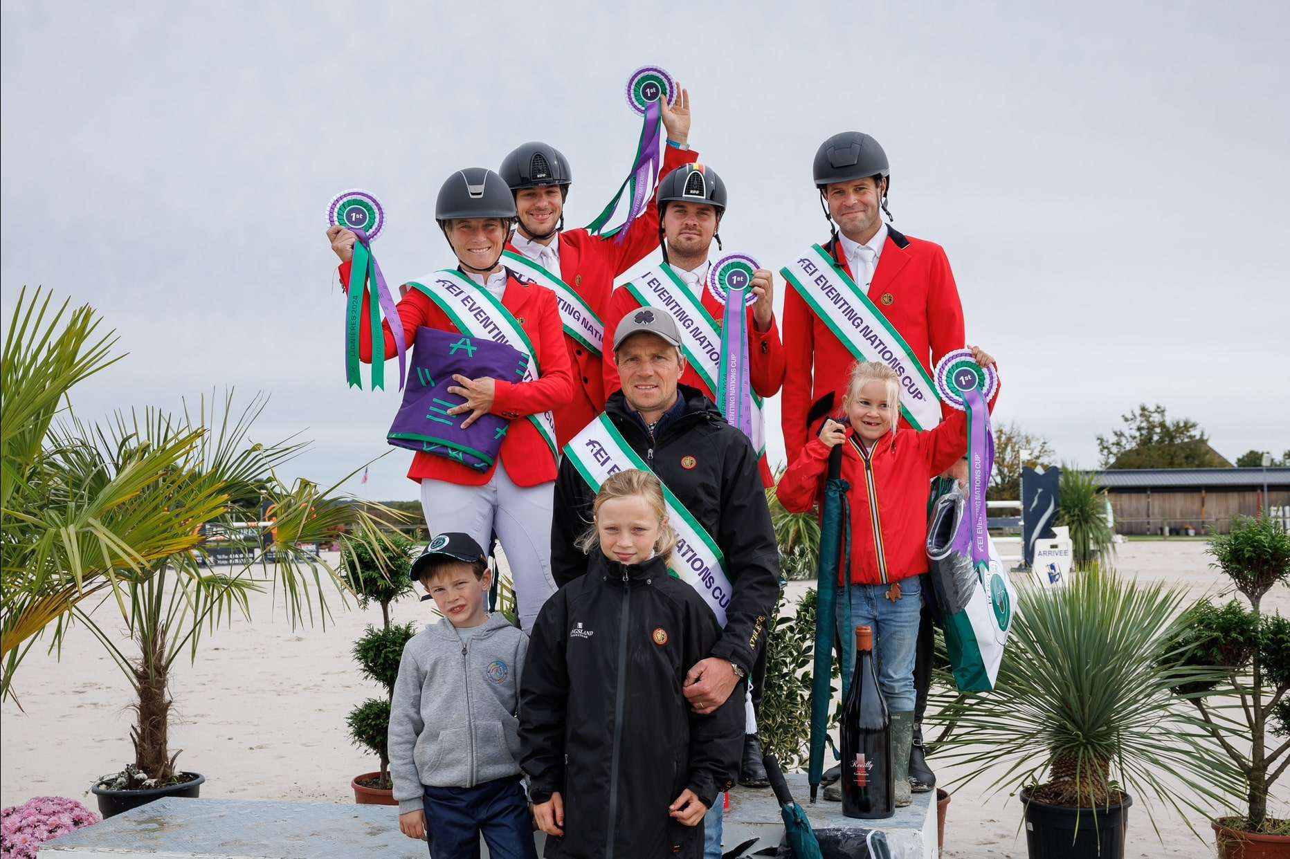 The winners, Team Belguim - Showjumpers stood on the podium with rosettes