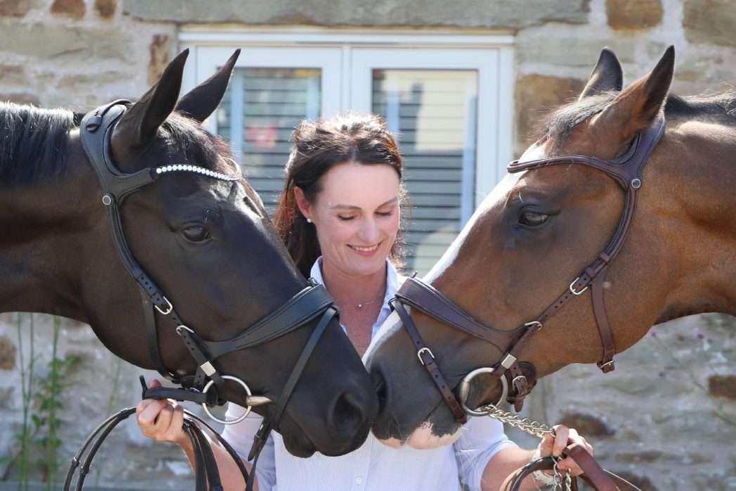 Keryn Clegg with a bay and black horse.