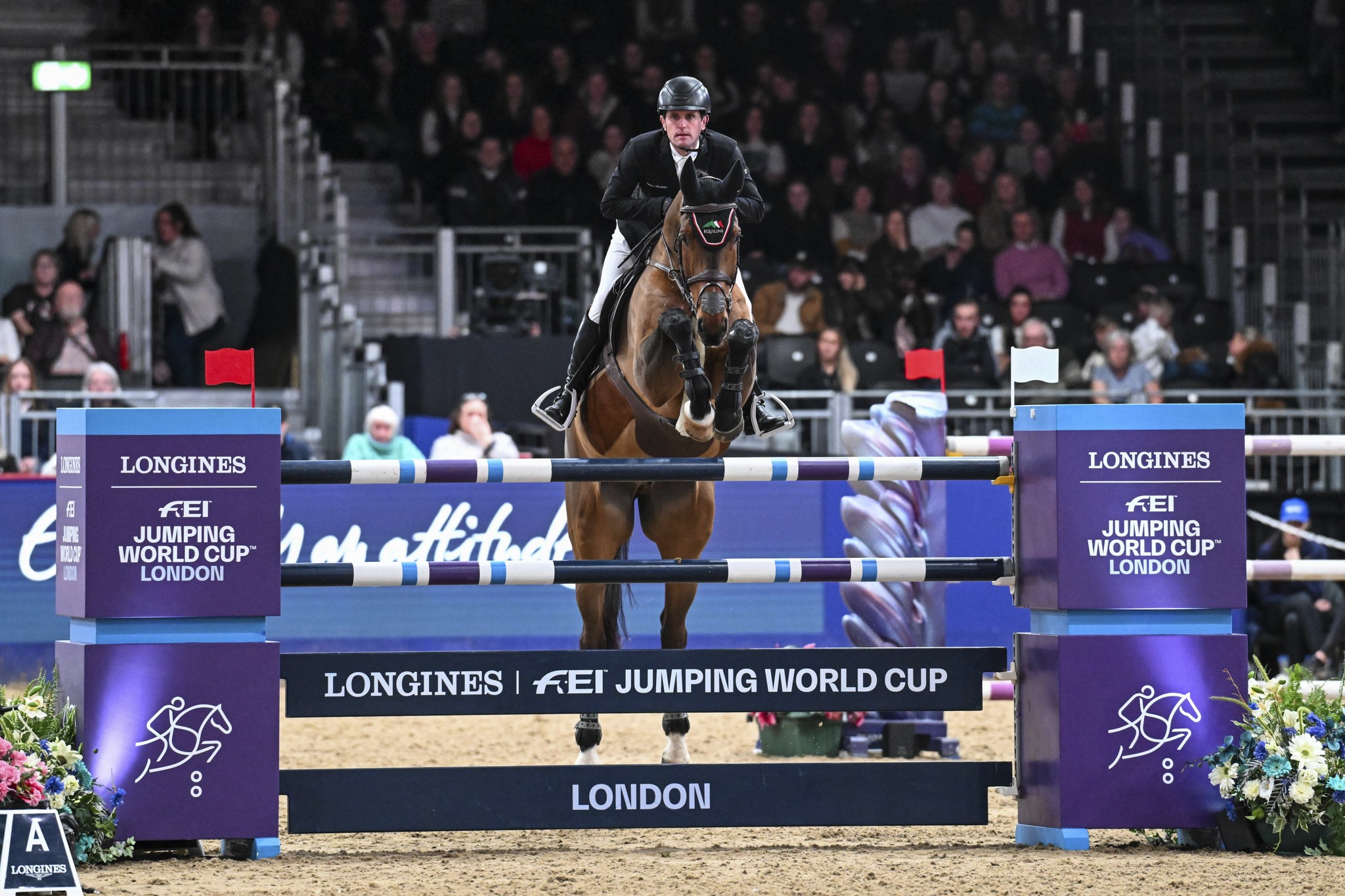 Darragh Kenny riding Eddy Blue winners of the Longines FEI Jumping World Cup™ Qualifier presented by Agria at London International Horse Show in 2024 @LondonInternationalHorseShow/Peter Nixon