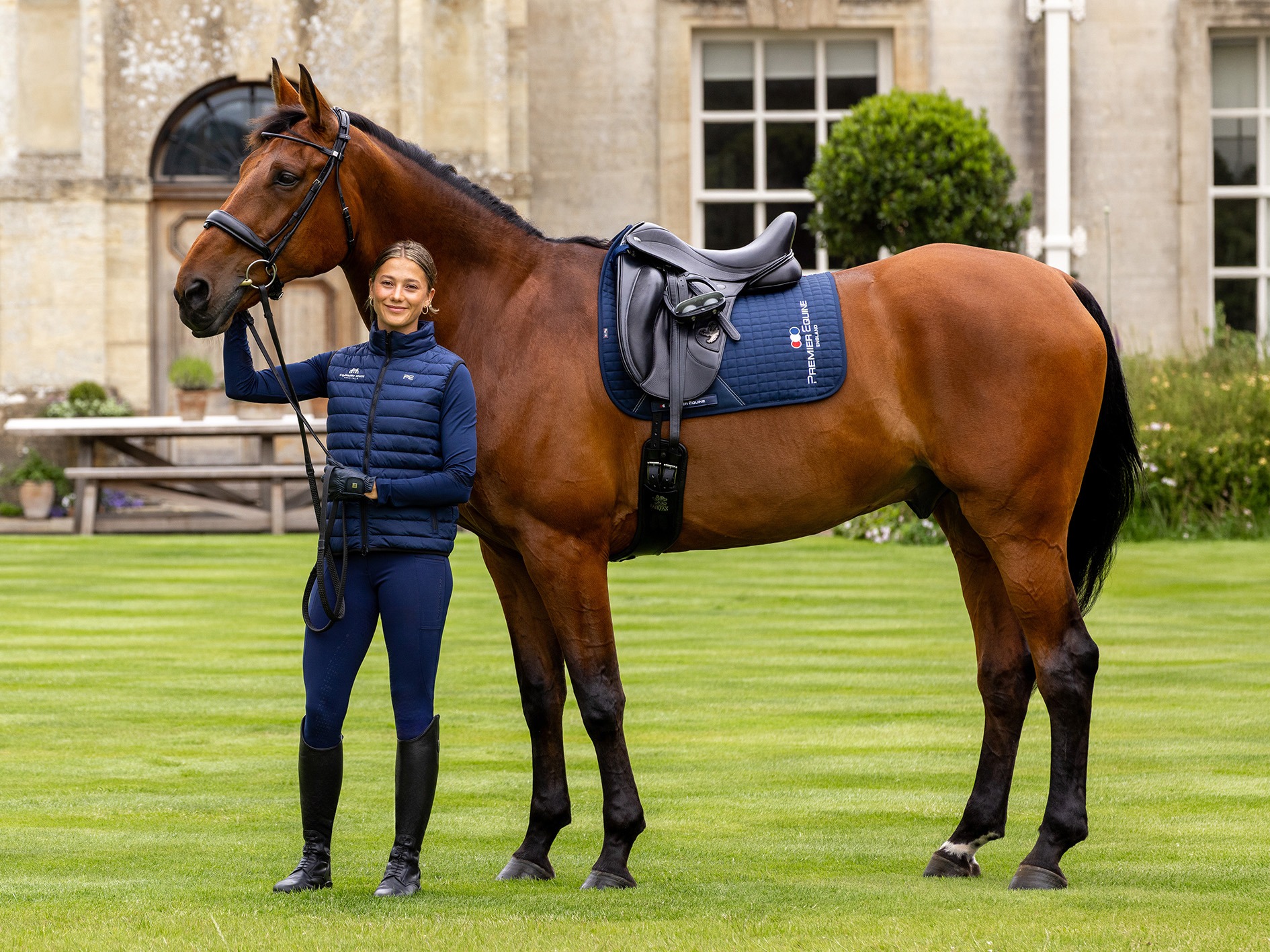 Cornbury House Horse Trials with a horse and rider wearing Premier Equine clothing